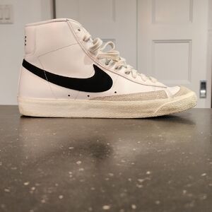 White Nike High-Top Sneakers with Black Swoosh